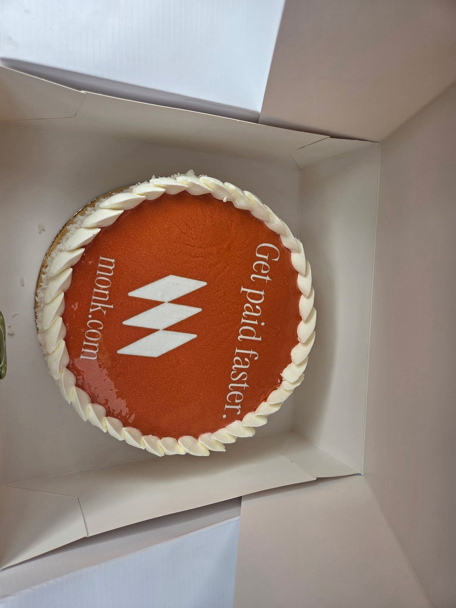 A custom branded cake delivered to a New York office