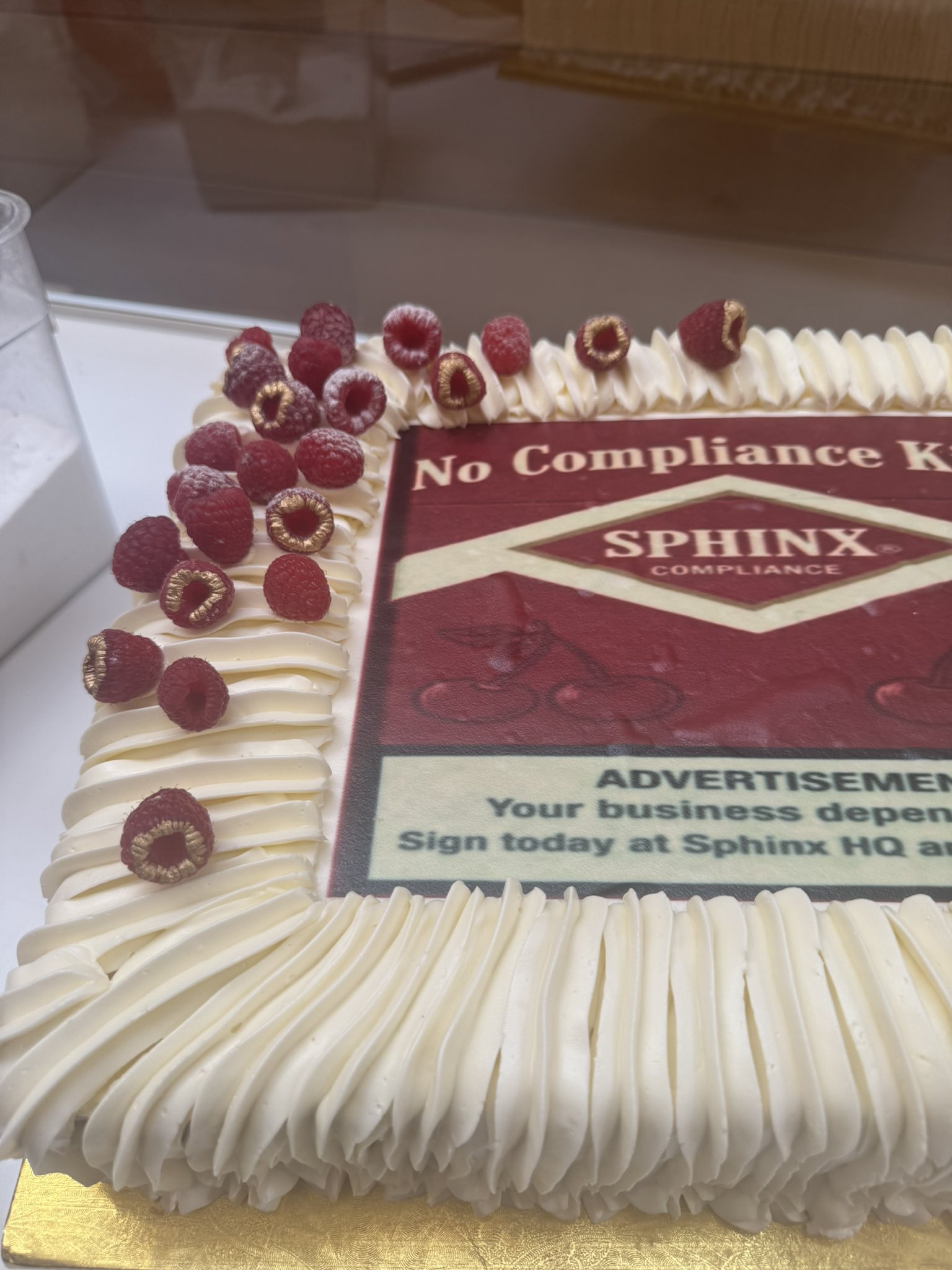 A Sphinx pitch cake designed like a cigarette pack