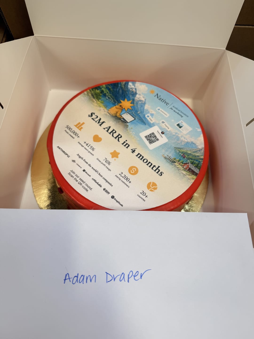 A boxed cake printed with a $2M ARR in 4 months pitch