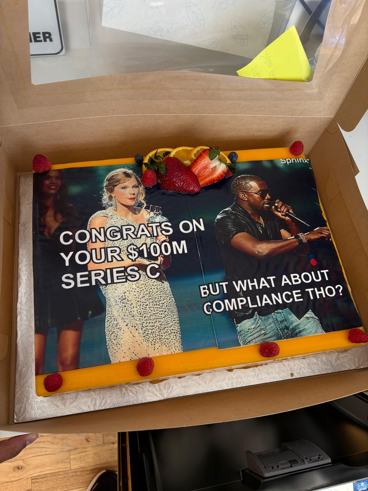A Sphinx pitch cake printed with a meme: Congrats on your $100M Series C. But what about compliance tho?